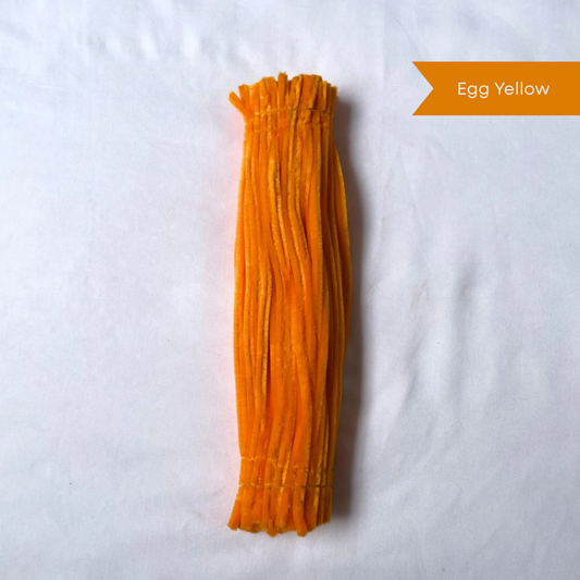 A Bundle of egg yellow pipe cleaners on a white background, available in 50 piece or 100 piece packs.