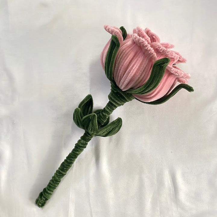 16 inches peach pink rose flower made with craft pipe cleaners on a white background