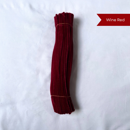 A bundle of Wine red pipe cleaners on a white background with a label indicating the color available in 50 piece and 100 piece packs
